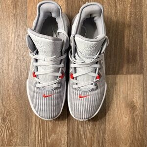 Nike Kids Light Gray Sneakers with Red Accents